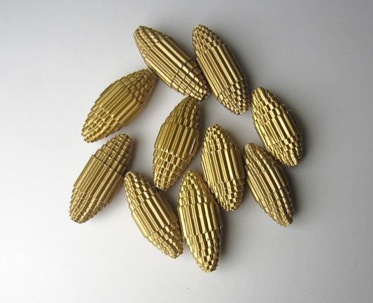 Golden Paper Beads made of corrugated cardboard - unfinished